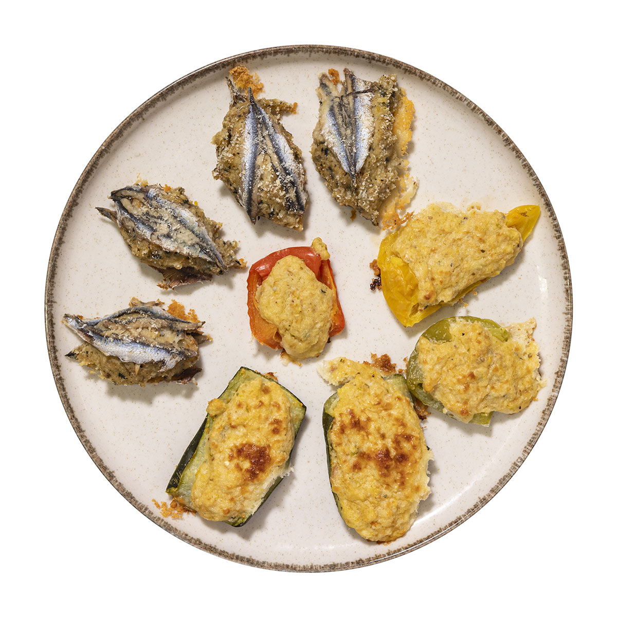 Piatto con verdure e acciughe ripiene